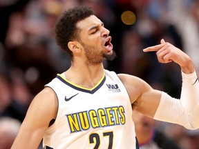 Denver Nuggets' Jamal Murray celebrates a three point basket against the Portland Trail Blazers on Monday. (GETTY IMAGES)