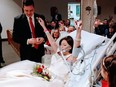 In this picture posted to Instagram, Heather Mosher celebrates after during her Dec. 22, 2017 wedding to David Mosher at St. Francis Hospital and Medical Center in Hartford, Conn.