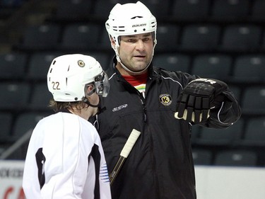Eric Lindros helps out at Kingston Frontenacs practice on Dec. 31, 2011