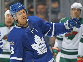 Connor Carrick #8 of the Toronto Maple Leafs celebrates a goal against the Minnesota Wild during an NHL game at the Air Canada Centre on November 8, 2017 in Toronto, Ontario, Canada.