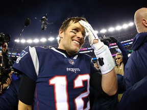Tom Brady #12 of the New England Patriots reacts after winning the AFC Championship Game against the Jacksonville Jaguars at Gillette Stadium on January 21, 2018 in Foxborough, Massachusetts.  (Photo by Maddie Meyer/Getty Images)