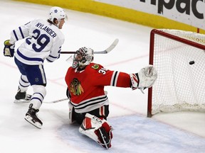 William Nylander #29 of the Toronto Maple Leafs scores the game winning goal against Jeff Glass #30 of the Chicago Blackhawks on a penalty shot at the United Center on January 24, 2018 in Chicago, Illinois. The Maple Leafs defeated the Blackhawks 3-2 in overtime. (Photo by Jonathan Daniel/Getty Images)