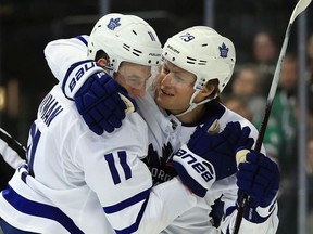 Zach Hyman #11 of the Toronto Maple Leafs and William Nylander #29 celebrate a goal against the Dallas Stars at American Airlines Center on January 25, 2018 in Dallas, Texas.