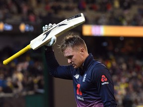 England batsman Jason Roy acknowledges the applause after being dismissed by Australia’s for 180 during their one-day international cricket match in Melbourne. (AFP)