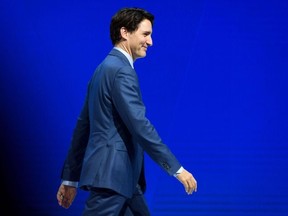Canadian Prime Minister Justin Trudeau leaves the stage after addressing the annual World Economic Forum (WEF) on January 23, 2018 in Davos, eastern Switzerland.
