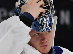 Frederik Andersen puts his mask on during a stop in play during a game against the Vegas Golden Knights on Dec. 31, 2017