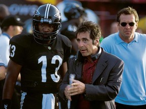 Jamie Foxx, Al Pacino and Dennis Quaid in a scene from "Any Given Sunday."
