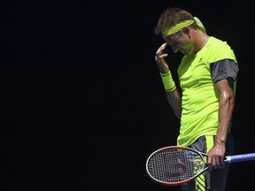 United States' Tennys Sandgren reacts after losing a point to South Korea's Chung Hyeon during their quarterfinal match at the Australian Open in Melbourne, Australia, Wednesday, Jan. 24, 2018.