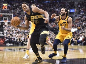 Toronto Raptors guard DeMar DeRozan (10) drives to the net as Utah Jazz guard Ricky Rubio (3) defends during second half NBA basketball action in Toronto on Friday, January 26, 2018.