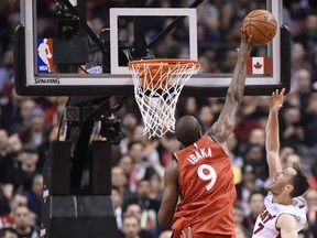 Toronto Raptors forward Serge Ibaka (9) rejects a shot from Miami Heat guard Goran Dragic (7) during first half NBA basketball action in Toronto on Tuesday, January 9, 2018. The Canadian Press