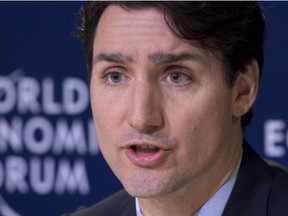 Prime Minister Justin Trudeau responds to a question during the closing news conference at the World Economic Forum Thursday, January 25, 2018 in Davos, Switzerland. THE CANADIAN PRESS/Paul Chiasson