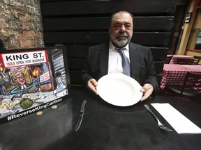 Kit Kat restaurant owner Al Carbone with an empty plate on Monday January 22, 2018. Jack Boland/Toronto Sun