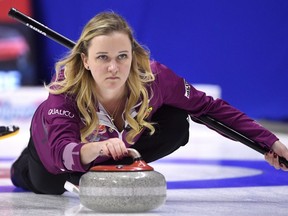 Skip Chelsea Carey of Calgary, Alta. throws a rock during a draw against Team Englot at the 2017 Roar of the Rings Canadian Olympic Trials in Ottawa on Friday, Dec. 8, 2017.