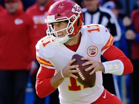 In this Nov. 19, 2017, file photo, Kansas City Chiefs quarterback Alex Smith looks to pass during an NFL game against the New York Giants