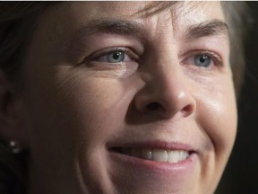 Former Conservative leadership candidate Kellie Leitch speaks to the media as she arrives for the national Conservative caucus in Victoria, B.C., Wednesday, Jan. 24, 2018. Leitch announced earlier that she won't seek re-election in 2019.