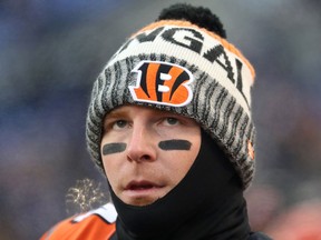 Quarterback Andy Dalton of the Cincinnati Bengals looks on from the sidelines prior to the game against the Baltimore Ravens on Dec. 31, 2017