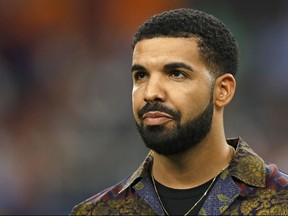 Rapper Drake looks on prior to the International Champions Cup soccer match between Manchester City against Manchester United at NRG Stadium on July 20, 2017 in Houston, Texas. (AARON M. SPRECHER/AFP/Getty Images)