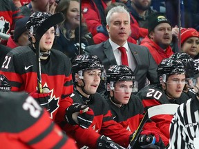 Dominique Ducharme, head coach of Canada, behind the bench in the first period against the Czech Republic during the IIHF World Junior Championship at KeyBank Center on January 4, 2018 in Buffalo.