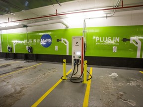GE WattStations (wall mounted) and Electric Vehicle Chargers Ontario (EVCO), white free standing unit,  at the parking lot under the MaRS Centre in Toronto, Ont. on Thursday January 18, 2018. Ernest Doroszuk/Toronto Sun)