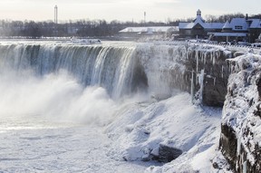 Ice coats just about everything close to the Niagara Falls and many visitors were out to catch a glimpse and a few photos of the winter spectacle on Wednesday, January 3, 2017. (Julie Jocsak/St. Catharines Standard)