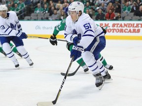 Jake Gardiner of the Toronto Maple Leafs skates the puck against the Dallas Stars at American Airlines Center on Jan. 25, 2018