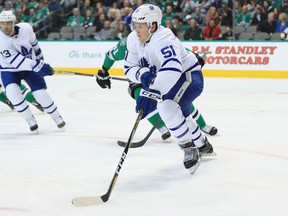 Jake Gardiner of the Toronto Maple Leafs skates the puck against the Dallas Stars at American Airlines Center on Jan. 25, 2018