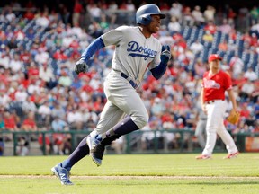 Los Angeles Dodgers' Curtis Granderson rounds the bases after hitting a home run on Sept. 21, 2017