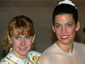 In this Jan. 12, 1992, file photo, Tonya Harding, left, and Nancy Kerrigan appear at the U.S. Figure Skating Championships in Orlando, Fla. (/, File)