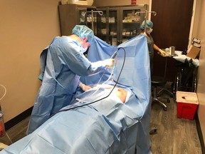 Marwan Khalifeh, a Washington-area cosmetic surgeon, performs a breast reduction procedure on a male patient. Khalifeh is seeing more men who want to reduce their breast size. MUST CREDIT: Photo by Eric Pianin