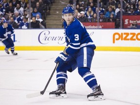 Maple Leafs defenceman Travis Dermott (3) watches the play during third period NHL hockey action against the Vancouver Canucks in Toronto on Saturday, January 6, 2018. THE CANADIAN PRESS/Christopher Katsarov