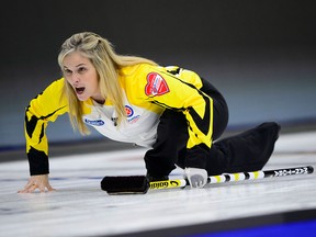 Manitoba skip Jennifer Jones calls the sweep as she takes on the Yukon at the Scotties Tournament of Hearts in Penticton, B.C., on Sunday, Jan. 28, 2018. THE CANADIAN PRESS/Sean Kilpatrick