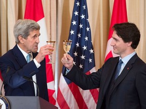 Prime Minister Justin Trudeau and then-U.S. Secretary of State John Kerry toast at a luncheon at the State Department in Washington, D.C. on Thursday, March 10, 2016.
