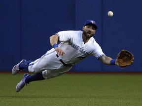 Toronto Blue Jays centre fielder Kevin Pillar dives for a ball in Toronto on Thursday July 6, 2017.(Veronica Henri/Toronto Sun)