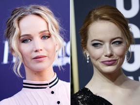 Jennifer Lawrence and Emma Stone (AFP/WENN.com)