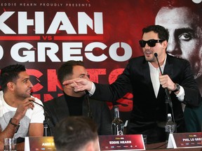 Boxers Phil Lo Greco and Amir Khan exchanged some heated words at a press conference in Liverpool on Tuesday. (Getty images)