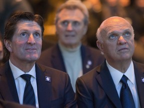 Toronto Maple Leafs coach Mike Babcock and Lou Lamoriello attend the Johnny Bower Celebration of Life service on Jan. 3, 2018