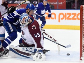 Toronto Maple Leafs centre Auston Matthews scores against Colorado Avalanche goaltender Jonathan Bernier during second-period action on Jan. 22, 2018. The goal was called back due to goaltender interference.