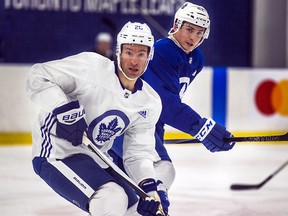 Dominic Moore (left) and Tyler Bozak skate during a Leafs practice at the MasterCard Centre in Toronto, Ont. on Wednesday January 17, 2018. (Ernest Doroszuk/Toronto Sun)