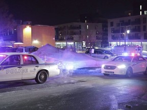 Police survey the scene of a shooting at a Quebec City mosque on January 29, 2017. The one-year anniversary of the Quebec City mosque shooting will be commemorated over a period of four days, beginning today. It was on Jan. 29, 2017, that a shooter entered the Islamic cultural centre of Quebec City and killed six while injuring 19 others, five seriously.