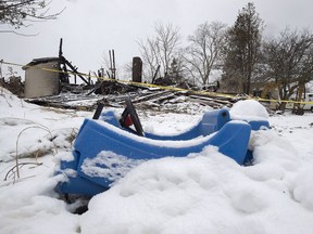 A toy car is seen on the property of a house destroyed in a weekend fire in Pubnico Head, N.S. on Monday, Jan. 8, 2018. The fire left four people dead, including at least two children, according to a relative.