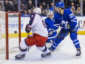 Toronto Maple Leafs William Nylander and goalie Frederik Andersen watch as Columbus Blue Jackets Artemi Panarin scores in OT on Jan. 8, 2018