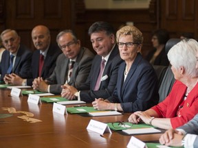 Ontario Premier Kathleen Wynne holds the first cabinet meeting after the announcement of a cabinet shuffle at Queen's Park in Toronto on June 13 , 2016. THE CANADIAN PRESS/Eduardo Lima