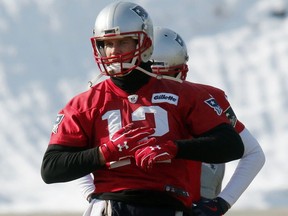 New England Patriots quarterback Tom Brady warms up during an NFL football practice, Friday, Jan. 19, 2018, in Foxborough, Mass. (AP Photo/Bill Sikes)