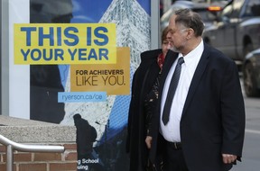 Barrie dermatologist Dr. Rod Kunynetz leaves from a hearing at the College of Physicians and Surgeons of Ontario’with counsel during a lunchtime break on Wednesday January 6, 2016. Jack Boland/Toronto Sun