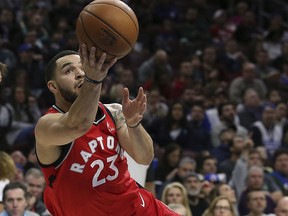 Toronto Raptors guard Fred VanVleet (23) attempts an off-balance shot against the Philadelphia 76ers Monday, Jan. 15, 2018. (AP Photo/Rich Schultz)