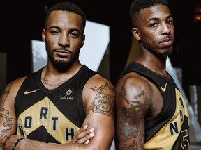 Norman Powell and Delon Wright sport the new Raptors jersey.