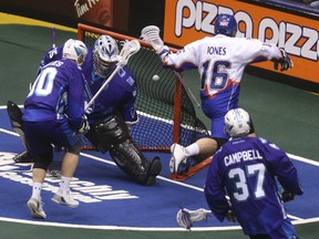 Rock's Adam Jones F  beats Rochester Kighthawks' Angus Goodleaf during the first half at the ACC on Friday night. (Jack Boland/Toronto Sun/Postmedia Network)