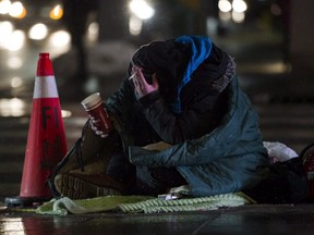 A homeless person is seen in downtown Toronto, on Wednesday, January 3, 2018.