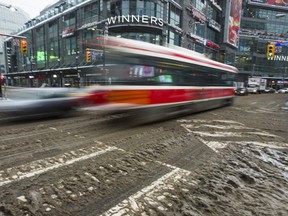 A TTC streetcar along Dundas St. at Yonge St. in downtown Toronto, Ont. on Friday December 22, 2017. Ernest Doroszuk/Toronto Sun/Postmedia Network