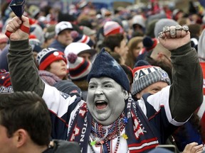 New England Patriots fan Keith Birchall, of Providence, R.I., cheers during an NFL football Super Bowl send-off rally, Monday, Jan. 29, 2018, in Foxborough, Mass. The Patriots are to play the Philadelphia Eagles in Super Bowl 52, Sunday, Feb. 4, in Minneapolis.
